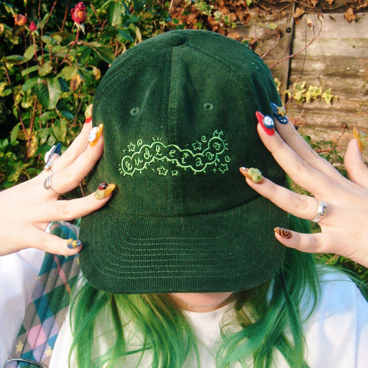 budleiaaa green corduroy cap