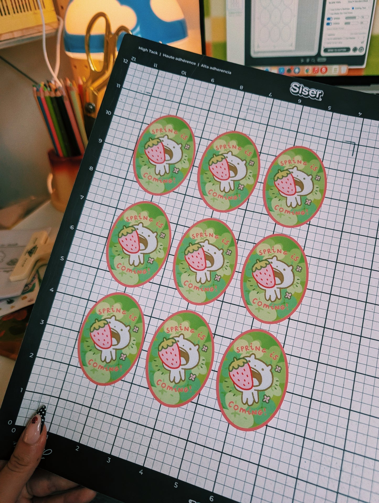 spring is coming with a strawberry in the mouth sticker