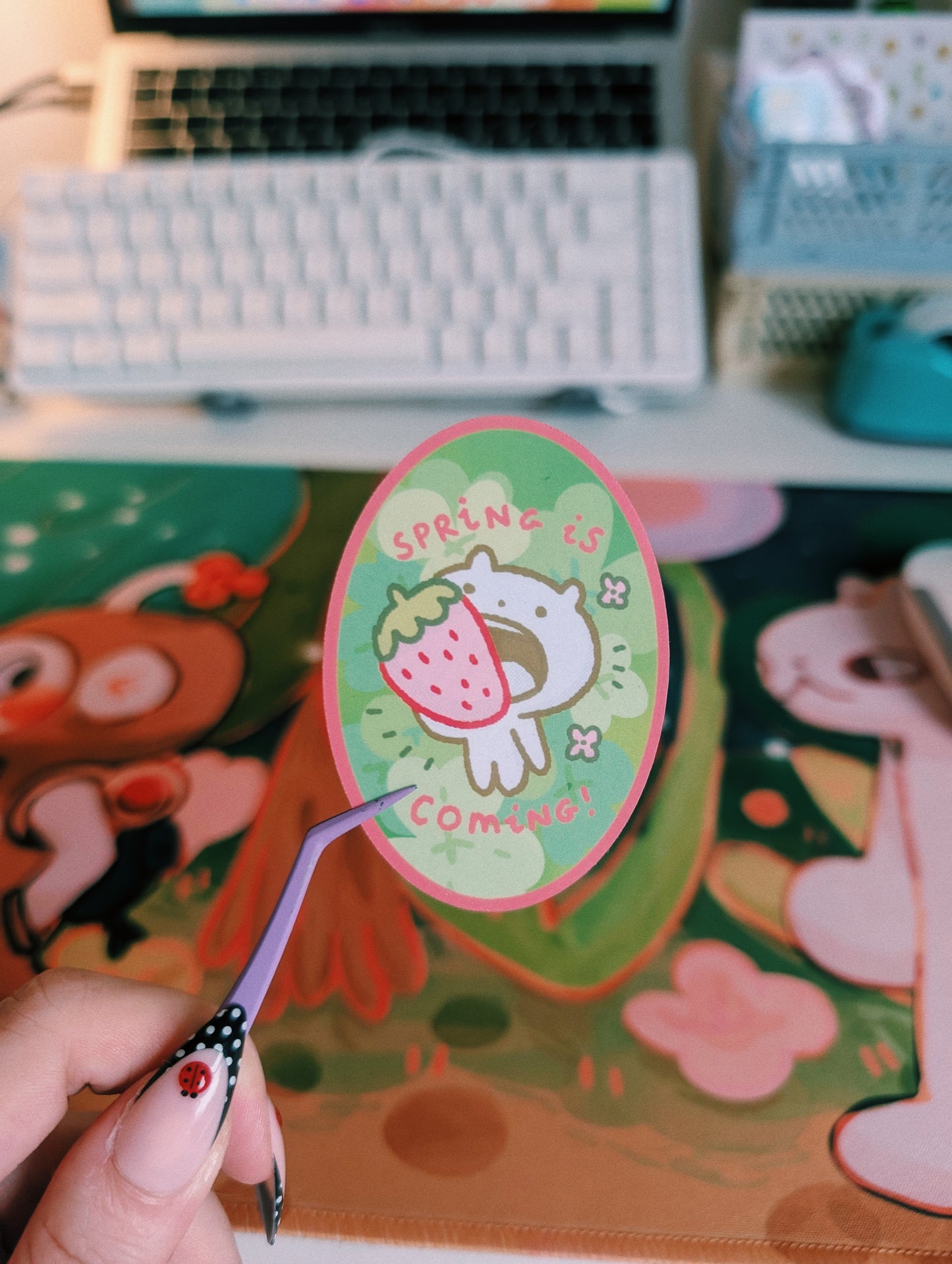 spring is coming with a strawberry in the mouth sticker