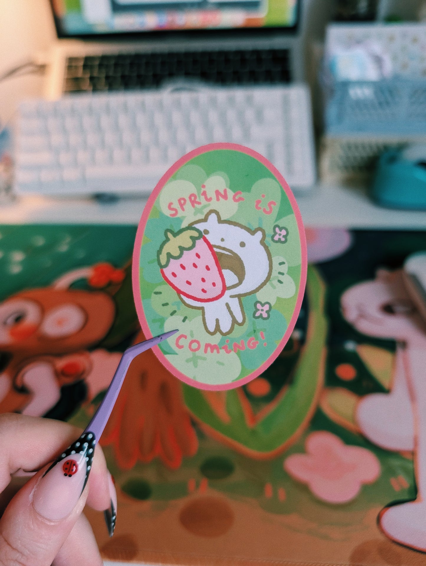 spring is coming with a strawberry in the mouth sticker